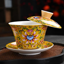 Load image into Gallery viewer, Chinoiserie Enamel Porcelain Tea Bowl with Rotating Three-Cup Design and Gold Lid