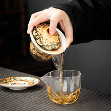 Load image into Gallery viewer, Chinoiserie Enamel Porcelain Tea Bowl with Rotating Three-Cup Design and Gold Lid