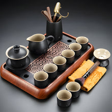 Load image into Gallery viewer, Black Clay Kung Fu Tea Set with Anti-scalding Handle Teapot and Matching Cups for Home Tea Ceremony