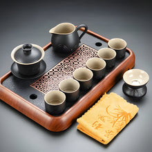 Load image into Gallery viewer, Black Clay Kung Fu Tea Set with Anti-scalding Handle Teapot and Matching Cups for Home Tea Ceremony