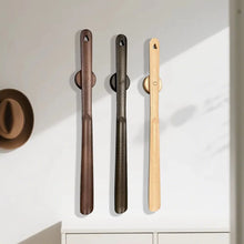 Load image into Gallery viewer, Ergonomic Walnut Magnetic Shoehorn with Wall Mount