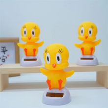 Load image into Gallery viewer, Solar Powered Swinging Dashboard Ornament – Eco-Friendly Car Interior Decoration
