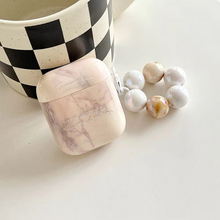 Load image into Gallery viewer, Marble Texture AirPods Case with Metal Keychain and Pearl Accent