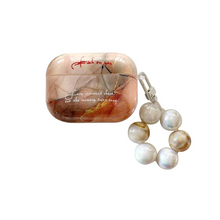 Load image into Gallery viewer, Marble Texture AirPods Case with Metal Keychain and Pearl Accent
