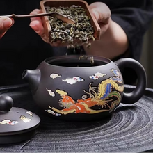 Load image into Gallery viewer, Yixing Purple Clay Teapot with Natural Color Transformation and Fine Mesh Infuser – 6.8 fl oz Capacity