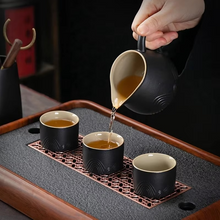 Load image into Gallery viewer, Black Clay Kung Fu Tea Set with Anti-scalding Handle Teapot and Matching Cups for Home Tea Ceremony