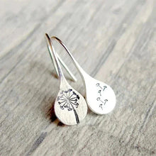 Load image into Gallery viewer, Close-up of women's sterling silver dandelion teardrop dangle earrings. Delicate unique design with real dandelion seeds.