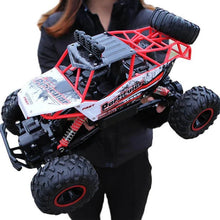 Load image into Gallery viewer, Rechargeable 1:12 Scale 4WD Remote Control Monster Truck with Two Battery Packs and a 2.4GHz Controller