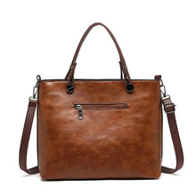 Load image into Gallery viewer, Multi Pocket Handbag with Adjustable Strap and Zippered Compartments