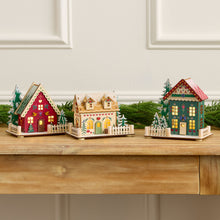 Load image into Gallery viewer, Laser Cut Wood Folk Cottage Set of 3 with LED Lights and Timer for Holiday Mantels and Tables

