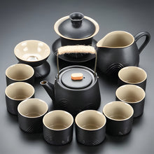 Load image into Gallery viewer, Black Clay Kung Fu Tea Set with Anti-scalding Handle Teapot and Matching Cups for Home Tea Ceremony
