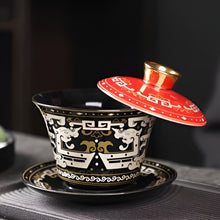 Load image into Gallery viewer, Chinoiserie Enamel Porcelain Tea Bowl with Rotating Three-Cup Design and Gold Lid
