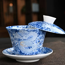 Load image into Gallery viewer, Chinoiserie Enamel Porcelain Tea Bowl with Rotating Three-Cup Design and Gold Lid

