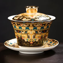 Load image into Gallery viewer, Chinoiserie Enamel Porcelain Tea Bowl with Rotating Three-Cup Design and Gold Lid
