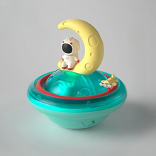 Load image into Gallery viewer, Interactive Astronaut Bath Toy with Automatic Water Spray, Lights, and Music

