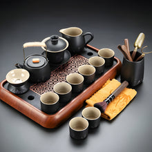 Load image into Gallery viewer, Black Clay Kung Fu Tea Set with Anti-scalding Handle Teapot and Matching Cups for Home Tea Ceremony
