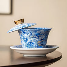 Load image into Gallery viewer, Chinoiserie Enamel Porcelain Tea Bowl with Rotating Three-Cup Design and Gold Lid
