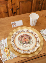 Load image into Gallery viewer, A Sophistiplate LLC Turkey &amp; Gourds: Thanksgiving Table for 16 place setting featuring a decorative turkey heavy duty paper plate on a gold charger, a striped paper cup, a place card with a bow, and a napkin decorated with gourds.

