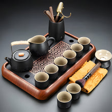 Load image into Gallery viewer, Black Clay Kung Fu Tea Set with Anti-scalding Handle Teapot and Matching Cups for Home Tea Ceremony
