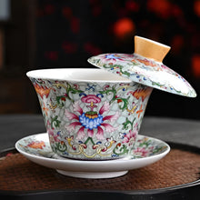 Load image into Gallery viewer, Chinoiserie Enamel Porcelain Tea Bowl with Rotating Three-Cup Design and Gold Lid
