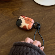 Load image into Gallery viewer, Black Brown Splash Ink Earphone Case with Rope
