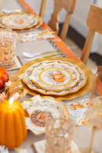 Load image into Gallery viewer, Create a festive autumn table with the Sophistiplate Turkey &amp; Gourds Table Setting, featuring designer plates, gold utensils, elegant glassware, and pumpkin décor in warm orange, gold, and neutral tones.
