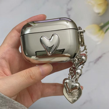 Load image into Gallery viewer, Electroplated Silver Soft TPU AirPods Case with Mirror Finish and Heart Keychain
