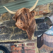 Load image into Gallery viewer, Woven Willow Highland Cow Resin Home Décor Figurine
