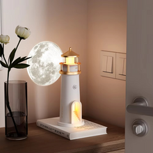 Load image into Gallery viewer, Moon Projection Lighthouse Night Light With Bluetooth Audio and Motion Sensor
