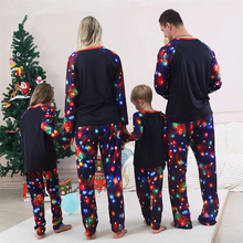 Load image into Gallery viewer, Christmas Family Matching Pajama Set 2025 – Cozy 2 Piece Holiday Cartoon Sleepwear for Parents and Kids
