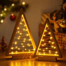 Load image into Gallery viewer, Timber Triangle Trees Set of Two in a Wooden Finish with Golden Fairy Lights at 14 and 10 Inches Tall
