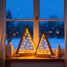 Load image into Gallery viewer, Timber Triangle Trees Set of Two in a Wooden Finish with Golden Fairy Lights at 14 and 10 Inches Tall
