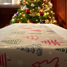 Load image into Gallery viewer, Beige Christmas tree print table runner by the tree
