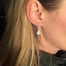 Load image into Gallery viewer, Chic women's sterling silver teardrop dangle earrings featuring a beautiful dandelion design. Elegant &amp; unique gift for her.

