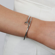 Load image into Gallery viewer, Silver Nail-Inspired Cuff Bracelet, Polished Minimalist Design
