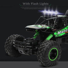 Load image into Gallery viewer, Rechargeable 1:12 Scale 4WD Remote Control Monster Truck with Two Battery Packs and a 2.4GHz Controller
