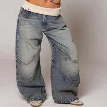 Load image into Gallery viewer, Women's Y2K baggy wide leg jeans with a ribbed waist, light blue wash for a retro streetwear look.
